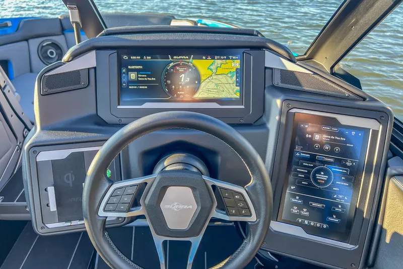 Slide: The Image of 2024 Supra SV 400 dashboard with advanced navigation and control screens on a boat. - 21