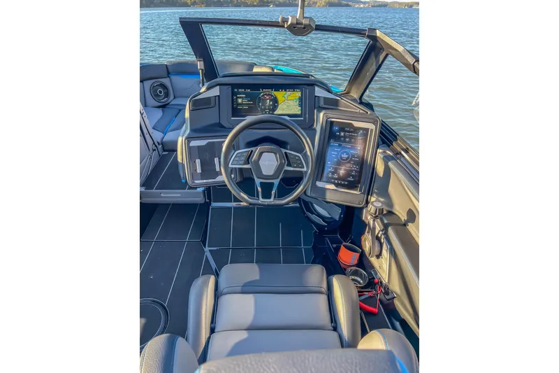 Slide: The Image of 2024 Supra SV 400 boat cockpit with advanced navigation and control systems. - 22
