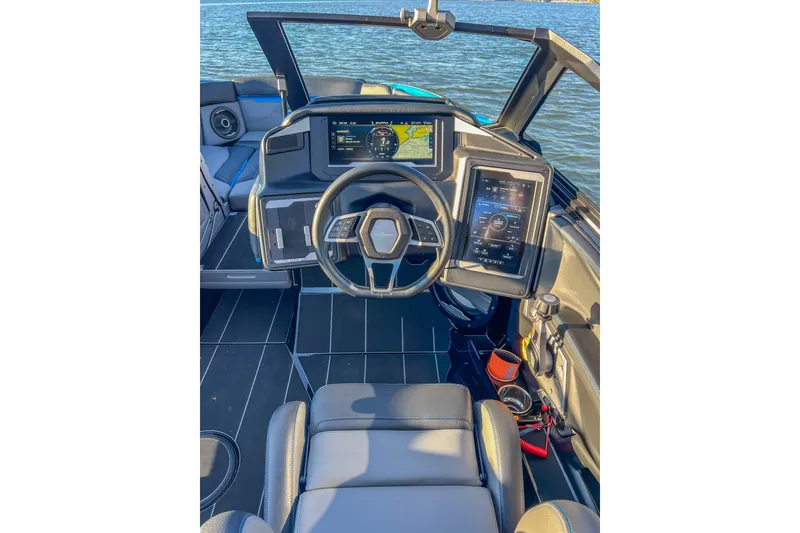 Slide: The Image of 2024 Supra SV 400 boat dashboard with advanced navigation and control systems. - 16