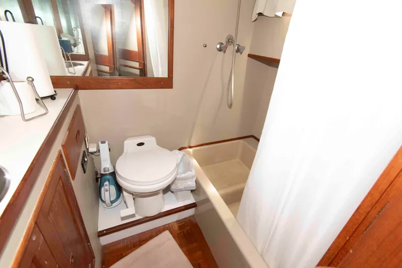 Slide: The Image of Bathroom interior of 1974 Grand Banks 42 Classic yacht, featuring shower and toilet. - 26