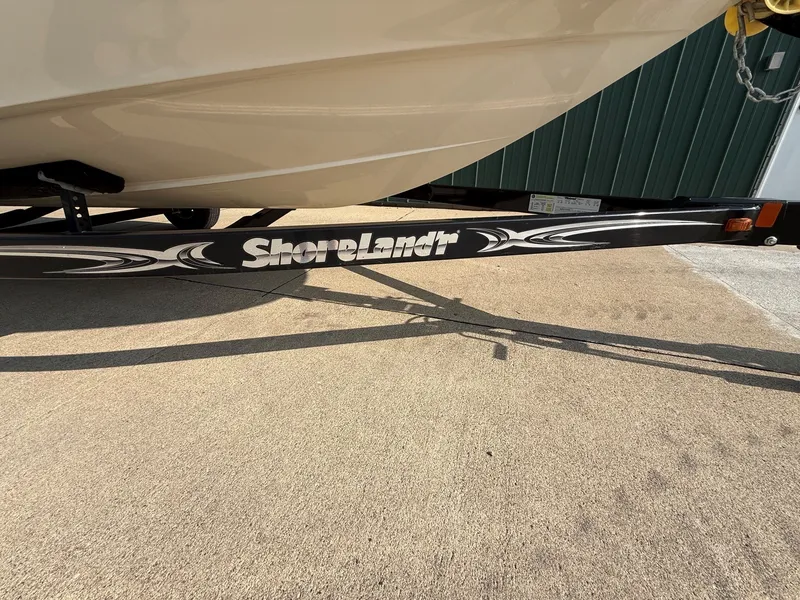 Slide: The Image of A 2006 Sea Ray 185 Sport on a ShoreLand'r trailer. - 27
