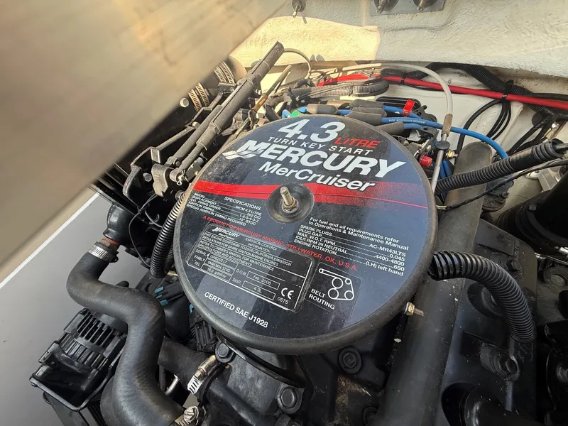 Slide: The Image of Engine compartment of a 2006 Sea Ray 185 Sport with a Mercury MerCruiser 4.3-liter engine. - 21