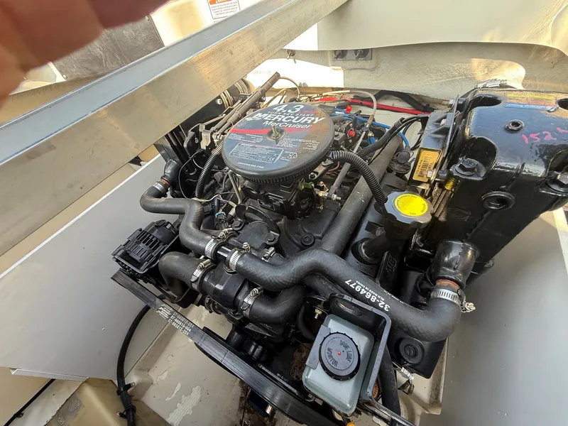 Slide: The Image of The engine compartment of a 2006 Sea Ray 185 Sport with a Mercury engine. - 20