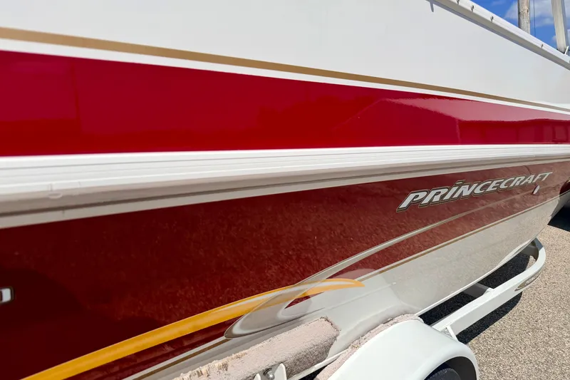 Slide: The Image of 2005 Princecraft Vacanza 210V O/B boat with red and white exterior detailing. - 10
