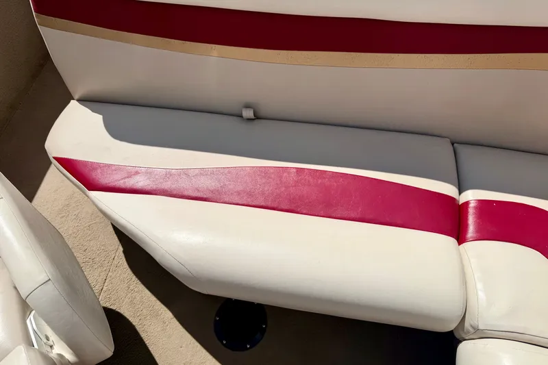 Slide: The Image of 2005 Princecraft Vacanza 210V O/B boat seat with red and beige upholstery. - 26