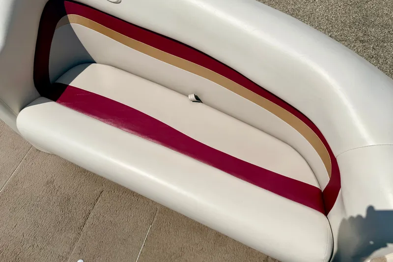 Slide: The Image of 2005 Princecraft Vacanza 210V O/B boat seat with red and beige accents. - 48