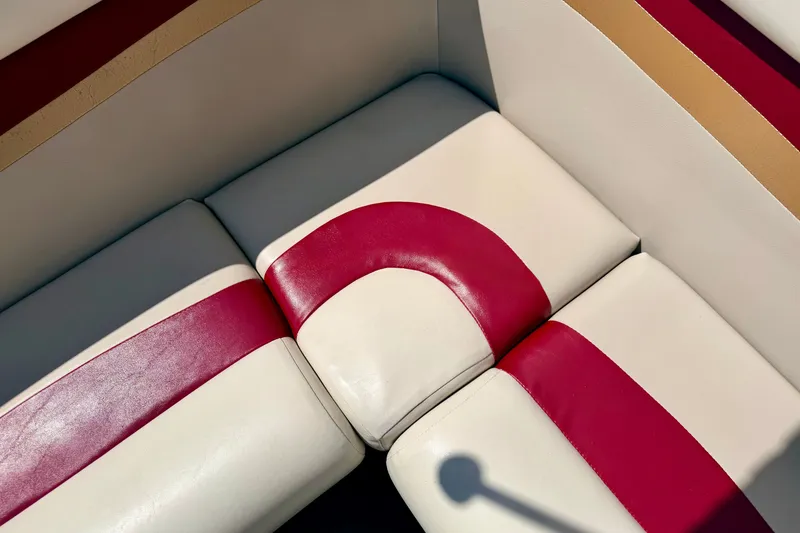 Slide: The Image of Red and white seating on a 2005 Princecraft Vacanza 210V O/B boat. - 28