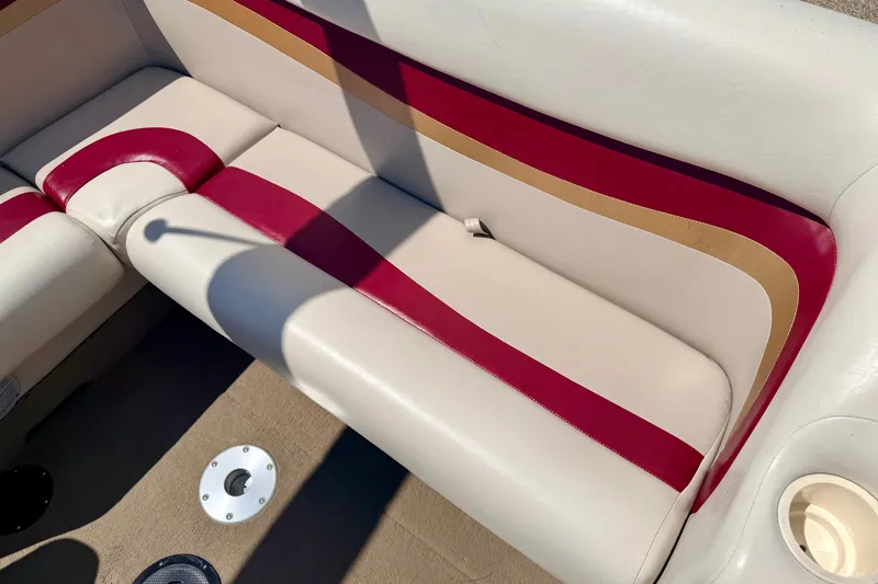 Slide: The Image of 2005 Princecraft Vacanza 210V O/B boat interior with red and beige seating. - 30