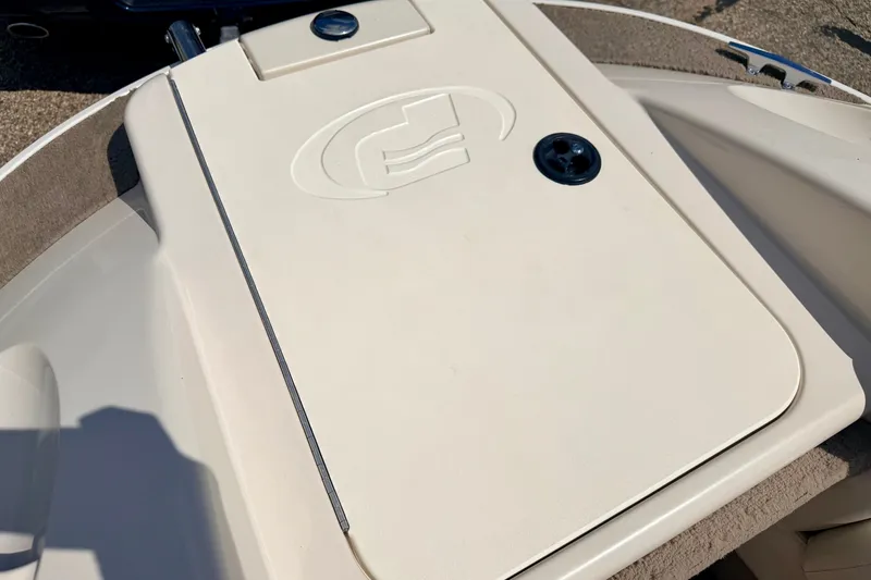 Slide: The Image of 2005 Princecraft Vacanza 210V O/B boat deck with storage compartment. - 49