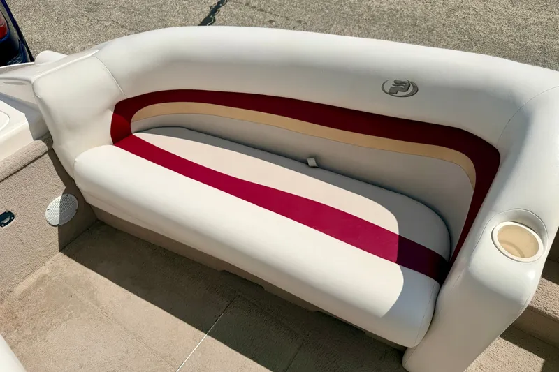 Slide: The Image of 2005 Princecraft Vacanza 210V O/B boat interior with red and beige seating. - 46