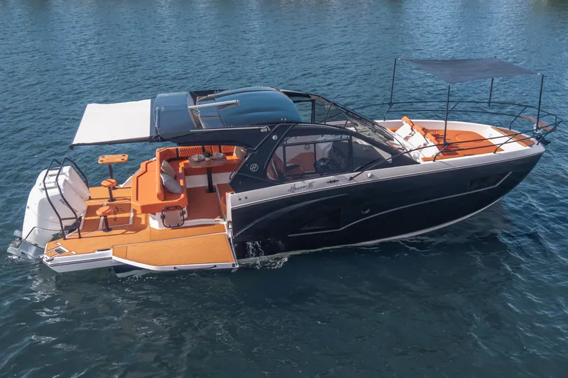 Slide: The Image of Luxurious 2026 Hanover 387 yacht with sleek design and spacious deck on calm water. - 8