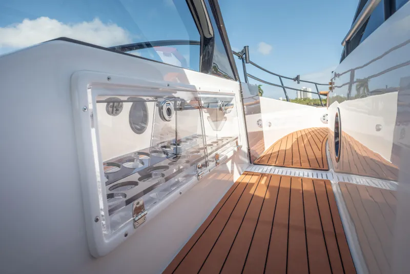 Slide: The Image of Modern Hanover 387 yacht deck with sleek design and wood flooring, 2026 model. - 17