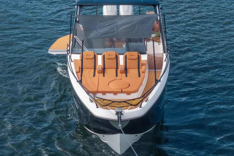 Slide: The Image of Luxurious 2026 Hanover 387 boat with sleek design and comfortable seating on open water. - 3