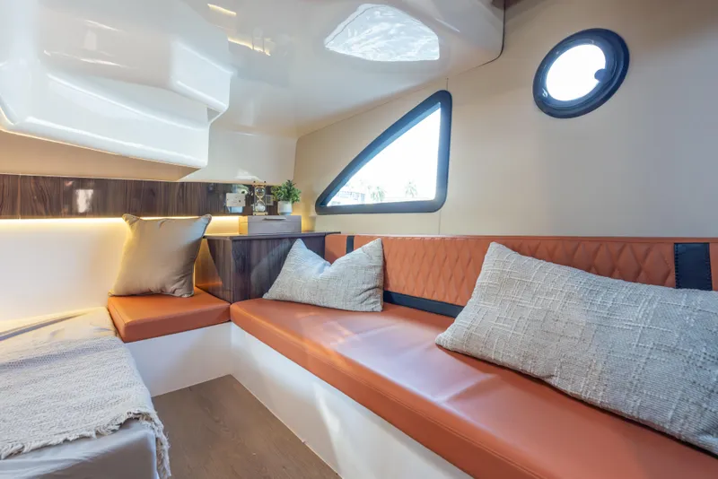 Slide: The Image of Luxurious interior of 2026 Hanover 387 yacht with plush seating and modern design. - 22