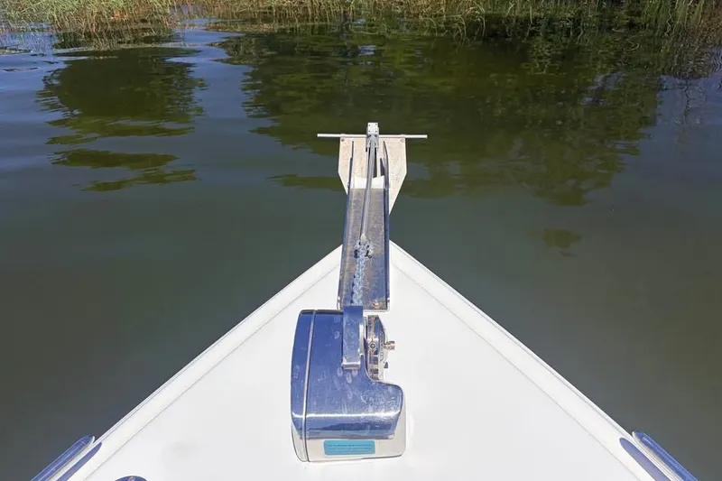 Slide: The Image of Bow view of 2018 Glasstream 280 Pro-XS boat with anchor in calm waters. - 17