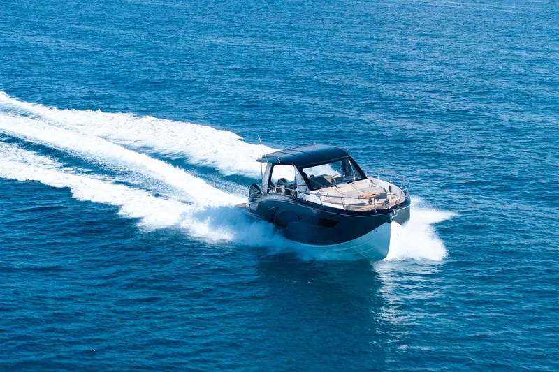 Slide: The Image of 2026 Hanover 447 yacht cruising on open blue sea. - 8