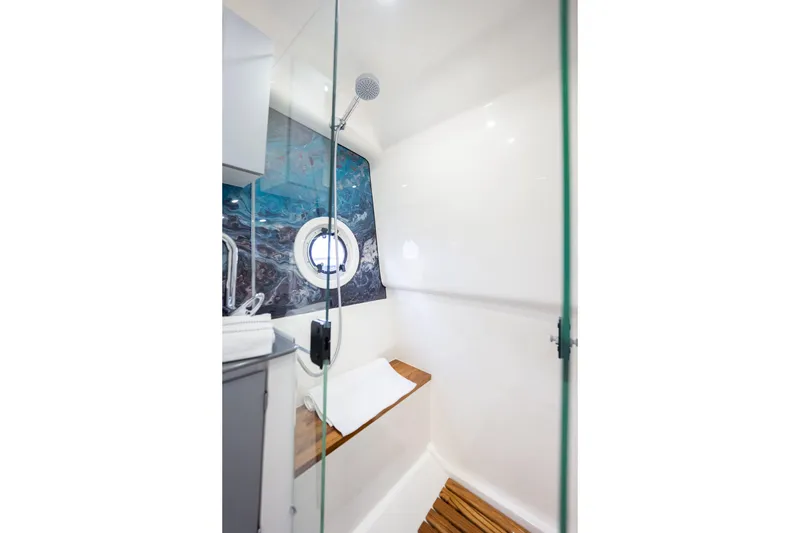 Slide: The Image of Modern shower cabin in Hanover 347, 2026 model, featuring glass door and wooden accents. - 44