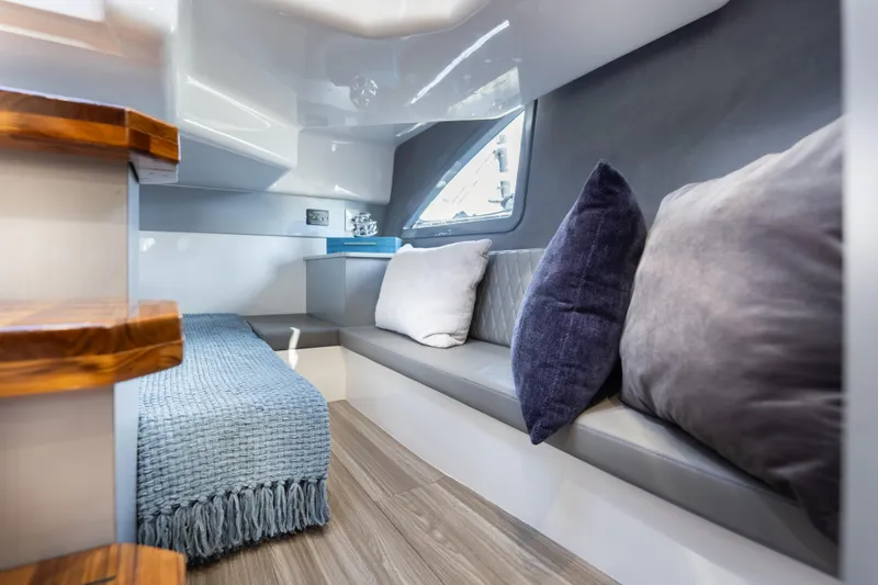 Slide: The Image of Luxurious interior of 2026 Hanover 347 yacht with cozy seating and elegant decor. - 33