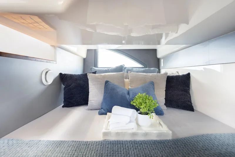 Slide: The Image of Luxurious cabin interior of 2026 Hanover 347 yacht with plush pillows and decor. - 40