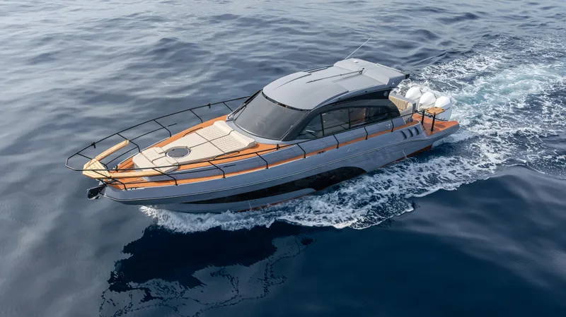 Slide: The Image of Luxurious 2025 Hanover 415 yacht cruising on open water. - 4