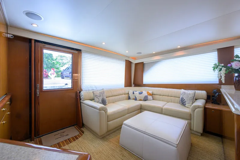 Slide: The Image of Luxurious interior of a 2001 Viking 55 Convertible yacht with plush seating and elegant decor. - 43