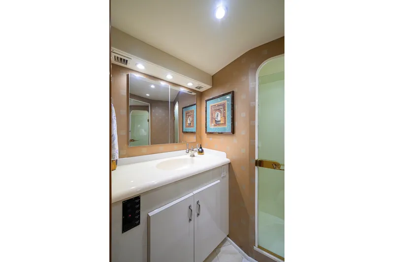 Slide: The Image of Luxurious bathroom interior of 2001 Viking 55 Convertible yacht with elegant fixtures. - 61
