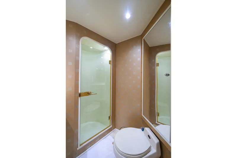 Slide: The Image of Bathroom interior of 2001 Viking 55 Convertible yacht with shower and toilet. - 63