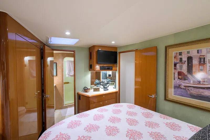 Slide: The Image of Luxurious cabin interior of 2001 Viking 55 Convertible yacht with elegant decor and amenities. - 58