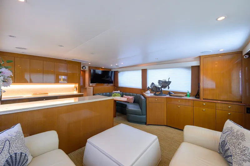Slide: The Image of Luxurious interior of 2001 Viking 55 Convertible yacht with elegant wood cabinetry and plush seating. - 45