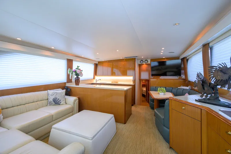 Slide: The Image of Luxurious interior of a 2001 Viking 55 Convertible yacht with elegant furnishings and decor. - 40