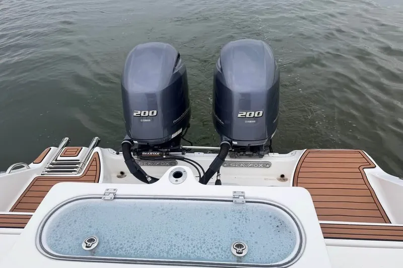 Slide: The Image of 2018 Sea Fox 266 Commander with twin Yamaha 200 engines on water. - 9