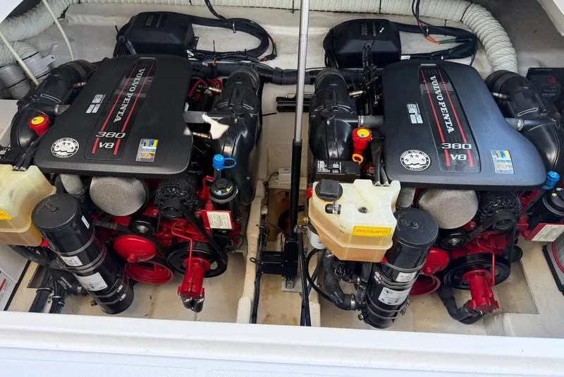 Slide: The Image of Twin Volvo Penta 380 V8 engines in a 2015 Rinker 340 Express Cruiser. - 40