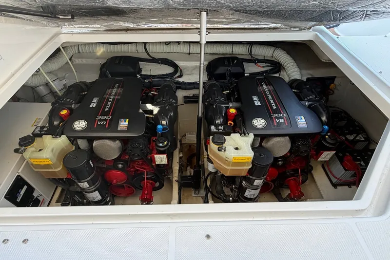 Slide: The Image of Engine compartment of a 2015 Rinker 340 Express Cruiser with dual Volvo Penta V8 engines. - 36