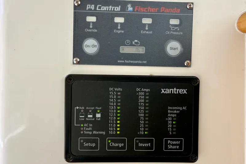 Slide: The Image of Control panels featuring Fischer Panda 7.5 KW Generator w/ 16.1 hours and Xantrex Freedom Marine 2000 Watt Inverter Charger control panels. - 29