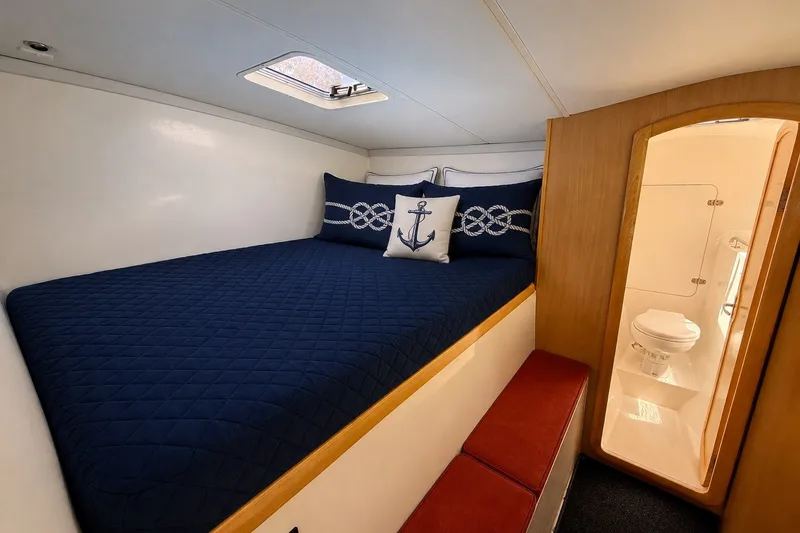 Slide: The Image of Guest stateroom and guest head/shower compartment forward in starboard hull. - 24