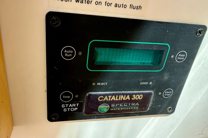 Slide: The Image of The Spectra Catalina 300 Fresh Water Maker is an energy-efficient, low-voltage marine desalination system producing 300 gallons per day. It utilizes a specialized Clark Pump energy recovery system to reduce power consumption. - 28