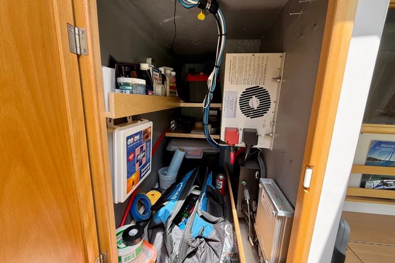 Slide: The Image of Storage compartment w/2000W Inverter Charger, Pastor Modem, First Aid, filled with tools and spares equipment. - 36