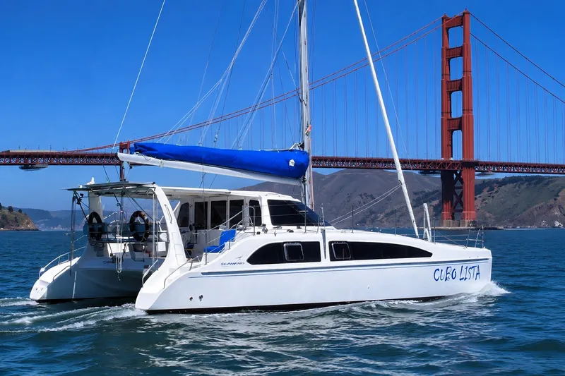 Slide: The Image of 2009 Seawind 1160 catamaran CUBO LISTA with Golden Gate Bridge on a sunny day. - 8