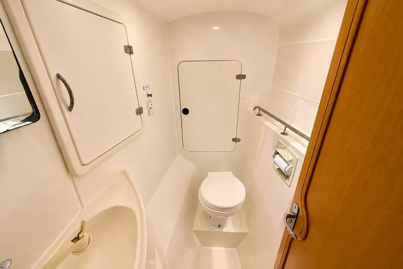 Slide: The Image of Guest head compartment w/ shower in the starboard side hull forward - 25