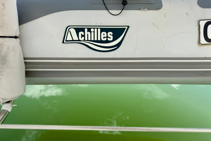 Slide: The Image of 2022 Achilles RIB Dinghy on davits - 14