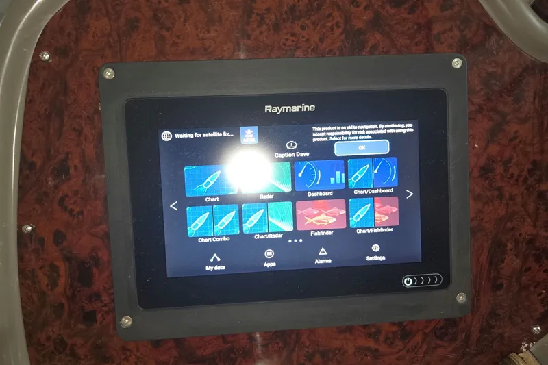 Slide: The Image of Raymarine navigation display on 2007 Regal Commodore 3760 IO boat dashboard. - 14