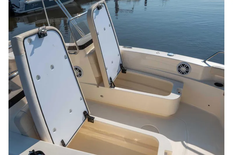 Slide: The Image of Manufacturer Provided Image: 2026 Scout 188 Sport Dorado boat with open storage compartments on deck. - 3