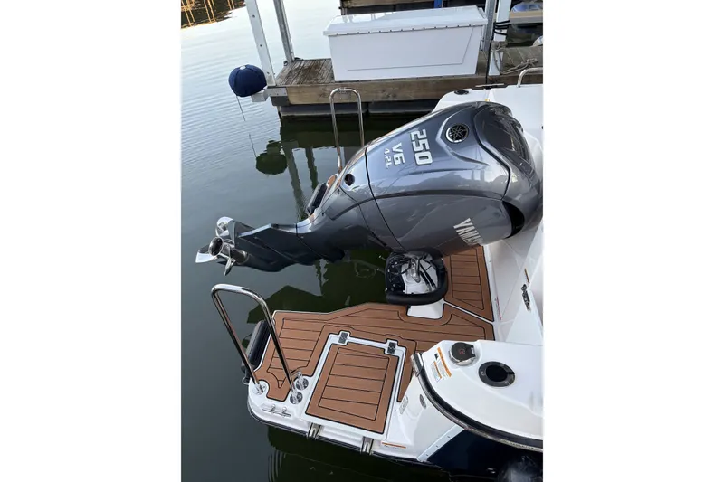Slide: The Image of 2022 Ranger Tugs R-25 with Yamaha 250 V6 outboard motor at dock. - 6