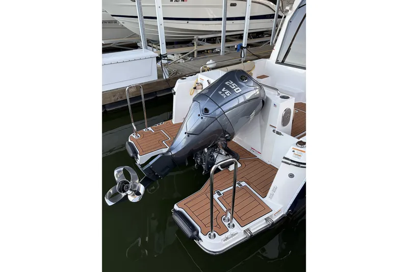 Slide: The Image of 2022 Ranger Tugs R-25 boat with Yamaha 250 V6 outboard motor at dock. - 5