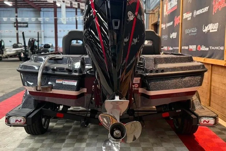 Slide: The Image of 2026 Nitro Z20 XL Pro boat rear view in showroom, showcasing sleek design and powerful engine. - 10