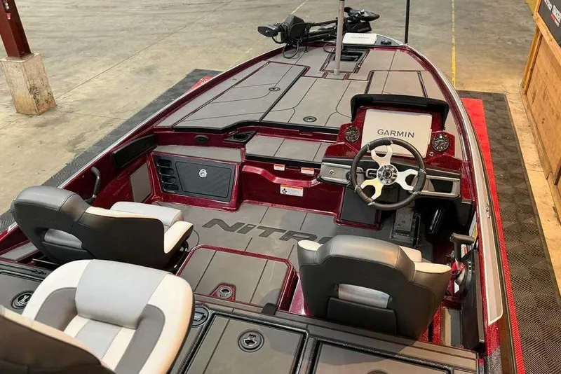 Slide: The Image of 2026 Nitro Z20 XL Pro boat interior with Garmin navigation system and dual seating. - 6