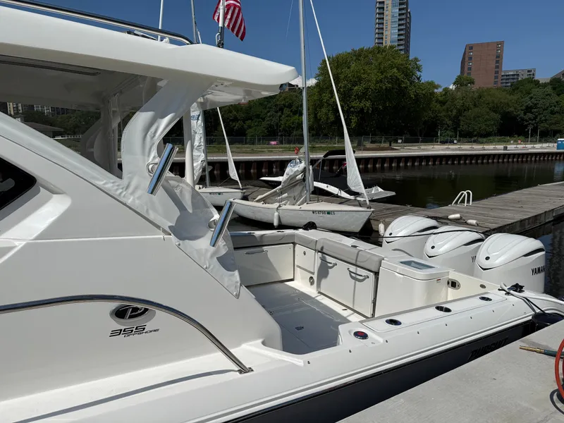 Slide: The Image of The 2027 Pursuit OS 355 Offshore is docked, featuring twin Yamaha engines. - 4