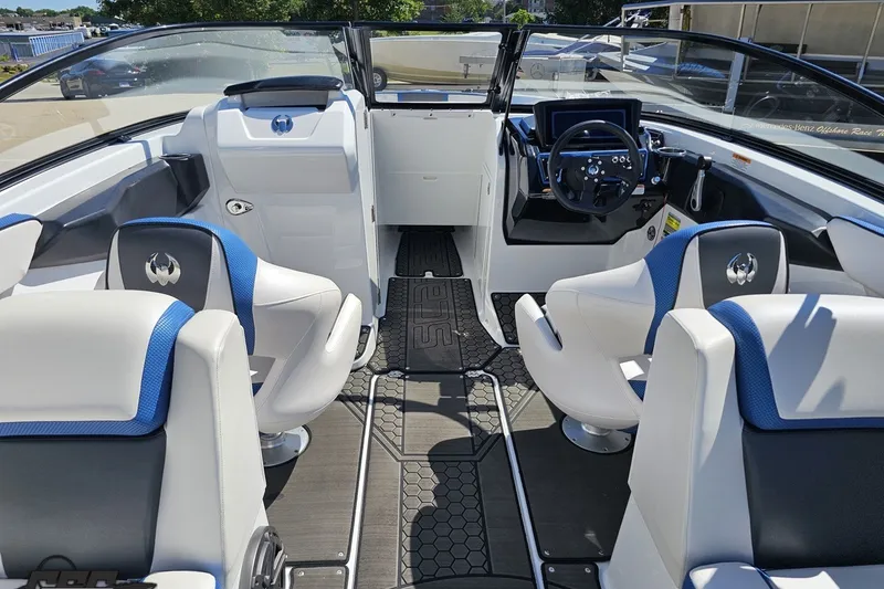 Slide: The Image of Interior of 2022 Scarab 255 Wake ID boat with modern seating and dashboard. - 59