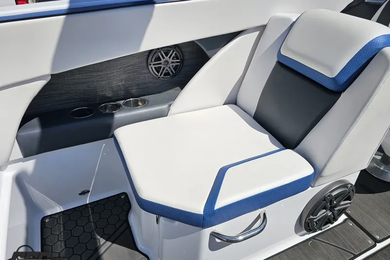 Slide: The Image of 2022 Scarab 255 Wake ID boat seat with blue accents and cup holders. - 52