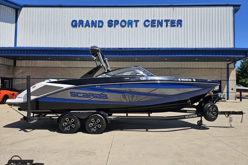 The Image of 2022 Scarab 255 Wake ID boat on trailer at Grand Sport Center. - 1